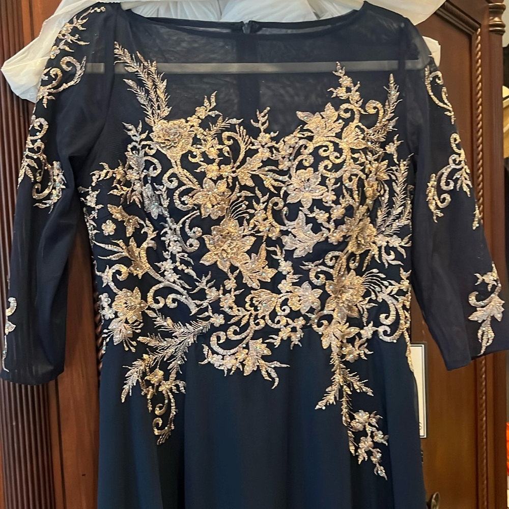 Formal women’s dress. NWT. Size 10 Navy
